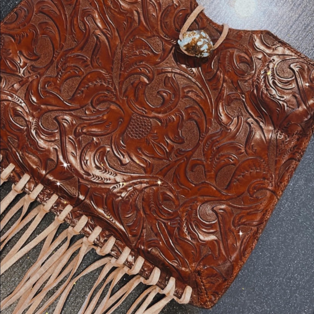 Tooled leather and fringe purse